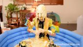 Condiments poured over Odette's wet and messy head