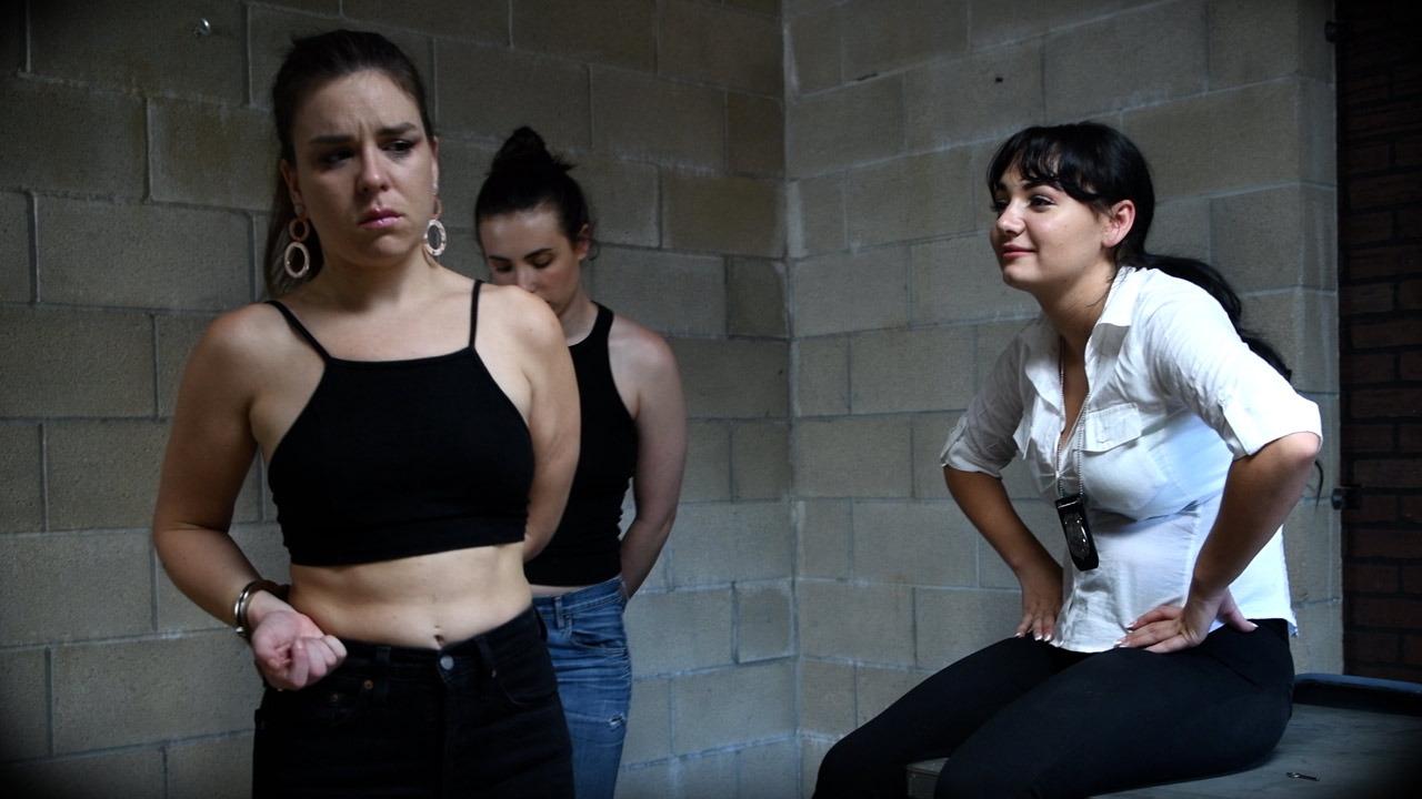 Cop Charlotte Cross arrests Juliette March and Casey Calvert